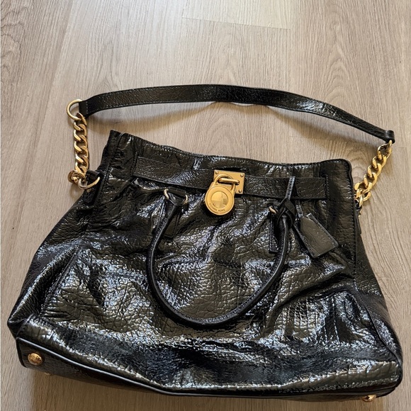 Michael Kors Shiny Black Tote with Gold Accents - Picture 2 of 9
